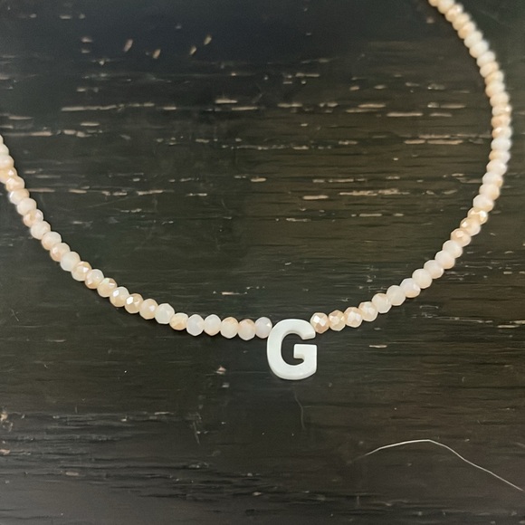 “G” initial necklace. Small white/beige beads with white initial. - Picture 2 of 3